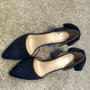 Slip on pumps navy blue satin. Never worn brand new. No box